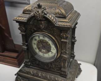 antique bronze clock with uranium painted face