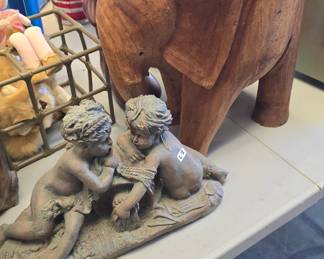 awesome elephant table and porcelain statue