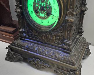 antique bronze clock with uranium painted face