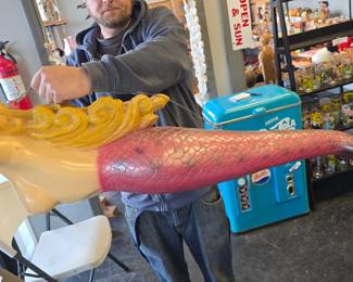 Large topless mermaid sculpture