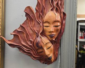 faces made out of dried leather