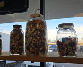 massive vintage jars full of vintage dice