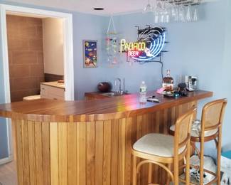 Bar; glass hanger; bar sign; tropical decor; bar stools