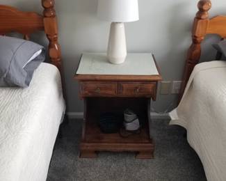 Nightstand; table lamp