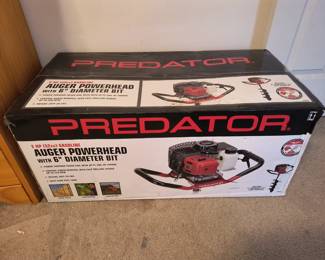 New - has powered auger
