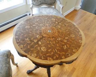 Mother of pearl marquetry table with lion claw feet