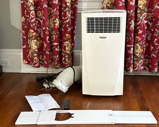 Haier Portable Air Conditioner | Haier Portable Air Conditioner with ventilation hose, window outlet, user manual and remote control. -  h. 27.5 x w. 14 x d. 11.5 in