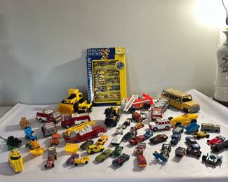 Miniature Car & Truck Toys | Assortment of Matchbox style miniature car and truck toys.