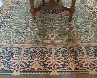 Belgian-Made Area Rug - 2 of 2 | Belgian-made area rug featuring green, blue and red swirling motifs. - w. 137 x l. 96 in (fringe to fringe)
