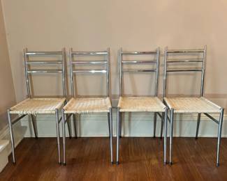 (4pc) Chrome Dining Chairs | Set of chrome framed dining chairs with plastic woven seats. Seat height: 18"H - h. 35 x w. 15 x d. 14.5 in