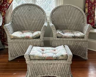 (3pc) White Wicker Chairs & Ottoman | 
Pair of white painted wicker armchairs with seat cushions and a wicker ottoman with cushion. - h. 38.5 x w. 28 in