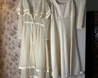 Ivory Gown With Belt | Vintage ivory silk/satin ladies' gown with belt. Size: No size listed. Measurements: 
Jacket Waist = 14"W
Jacket Length = 52"L
Gown Waist = 16"W
Gown Length = 51"L
Belt = 30"L