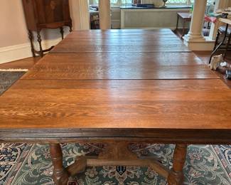 Frederick Style East Lake Dining Table | 
Large oak dining table with center removable leaf and expanding hardware beneath. From the late 1800's, with Extension Leaf - h. 28 x w. 43.75 x l. 76 in