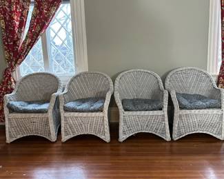 (4pc) White Wicker Armchairs | Set of four white painted wicker armchairs with blue and white seat cushions. -  h. 34.5 x w. 27.5 in
