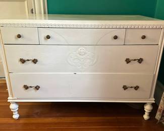 White Dresser with Five Drawers | White painted dresser with five drawers and intricate carved motifs and original hardware. - h. 34 x w. 47 x d. 23 in
