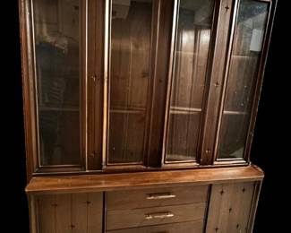 Broyhill China Cabinet | Vintage mid-century modern Broyhill "Saga" walnut china cabinet. n.b. first photo and last three photos are stock images, images 2-6 are of the exact piece. Top: 43.5"H x 54”W x 13”D
Base: 25.75"H x 54.75”W x 18.25”D


