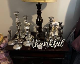 Silver candle holders of all weights