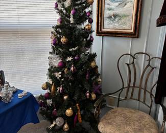Trimmed 5' tree.  Can be sold trimmed, can purchase ornaments, or just purchase tree.  NOtice our Iron French Chair (2)