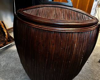 Oblong reed basket approx 28". Unique lid and handle.