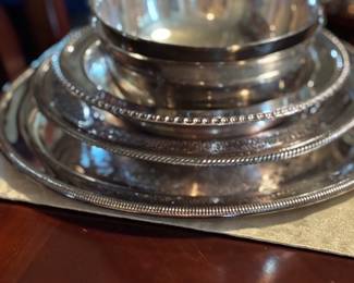 Wonderful silver collection consisting of platters, bowls, Tea and Coffee Sets, Accessories ie. tongs, cake and pie servers, knife and serving fork sets, serving spoons of all sizes, ladles, salad sets, trays with and without handles, cream and sugar sets, pitchers,  etc