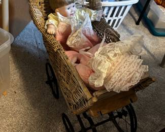 Wicker buggy with dolls to choose from