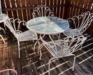 Love our French influenced chairs and table for deck or patio or all season room