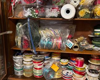 Incredible Assortment of ribbon of all kinds, widths, patterns, length.