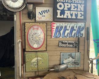 many collectable signs, mirrors & some clocks (clock works !)