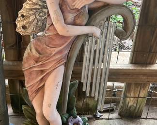 Outdoor Fairy with wind chime decoration