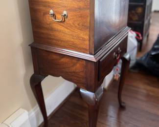 Henkel Harris Drop-Front Flame Mahogany Queen Anne Silver Chest with Satinwood Inlay. Measures 21.5" W x 17.25" D x 40" H. Photo 4 of 5.