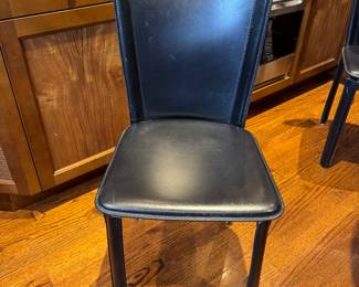 Noguchi Cyclone Dining Table & Mario Bellini Black Leather Chairs. Measures 36" D x 29" H. Photo 3 of 4.