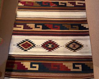 Handwoven Southwestern Rug. Measures 2' x 3' 8".