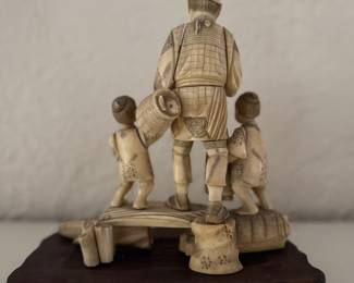 Japanese Carved Bone Sculpture of Man and 2 Sons. Photo 3 of 3.