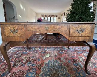 Queen Anne Style Writing Desk with Tooled Leather Top and Three Drawers. Measures 49" W x 27" D x 29.5" H. Photo 2 of 5.