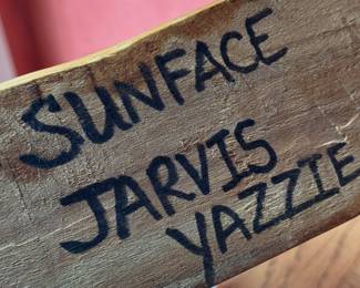 "Sunface," Hand-Carved, Hand-Painted Wood Kachina Doll Signed by Artist, Jarvis Jazzie. Measures 13" W x 7" D. Photo 2 of 2.