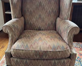 High Back Wing Back Chair Upholstered in Flame Stitch Fabric on Straight Legs. Has Down-Filled Cushion. Measures 33" W x 30" D. Photo 1 of 4.