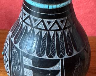Rounded Blackware Pottery Vase with Sgraffito Carving and Turquoise Trim Signed by Red Starr, Sioux. Measures 4" H. Photo 1 of 2.
