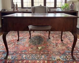 Queen Anne Style Writing Desk with Tooled Leather Top and Three Drawers. Measures 49" W x 27" D x 29.5" H. Photo 1 of 5.