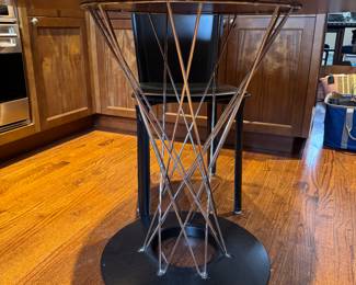 Noguchi Cyclone Dining Table & Mario Bellini Black Leather Chairs. Measures 36" D x 29" H. Photo 2 of 4.