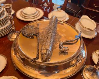 Fabulous round silver cake, plate, and other silver items