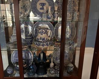 A cabinet full of spode