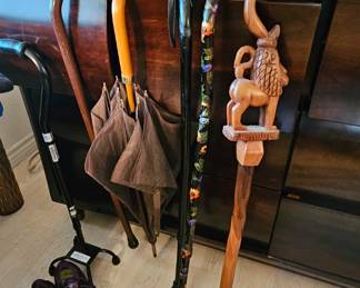 Carved walking canes.