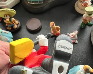 lots of Disney figurines...