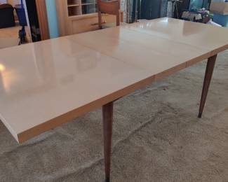 This table has been covered with pads, hence in mint condition.