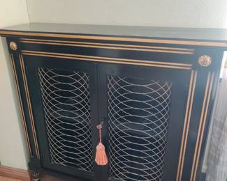 ***We're taking bids on this beautiful Mid-Century Regency-style Black Lacquer/gilt-painted Italian Cabinet, which certainly makes a statement. It's a rare find! ** You can email your bid to proqfineart@gmail.com or text your bid to 314-601-1899 anytime until the sale closes on 3.1.25 at 3 p.m. **The highest bidder will be notified on Saturday, March 1, 2025, within 2 hours after the local sale ends. Local pickup or your carrier.