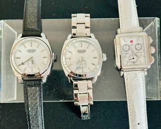 Coach (L and middle) and Michele (R) watches 