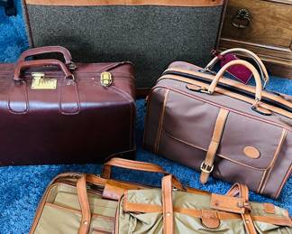 Vintage Hartmann luggage and vintage Camelier and Buckley Italian-made weekender (upper R)