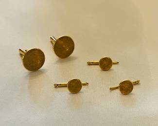 Gold cufflinks and three studs for tuxedo finery