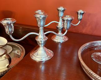 Sterling candleholders (priced as a pair). 