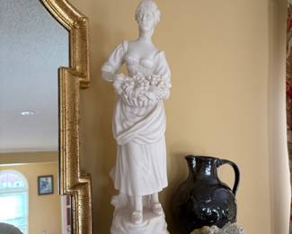 Alabaster statue.  One of a pair.  